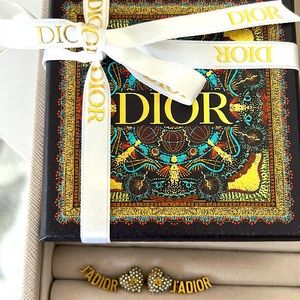 Christian Dior “J’Adior”  rhinestone heart earrings.